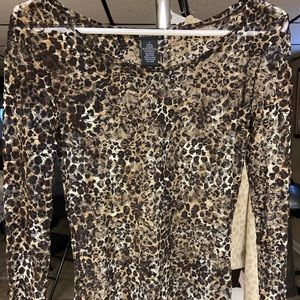 A long sleeve see-through cheetah print shirt size small